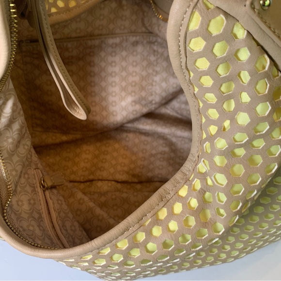Charming Charlie Tan and Yellow Buttercup perforated Hobo Handbag - Picture 9 of 10